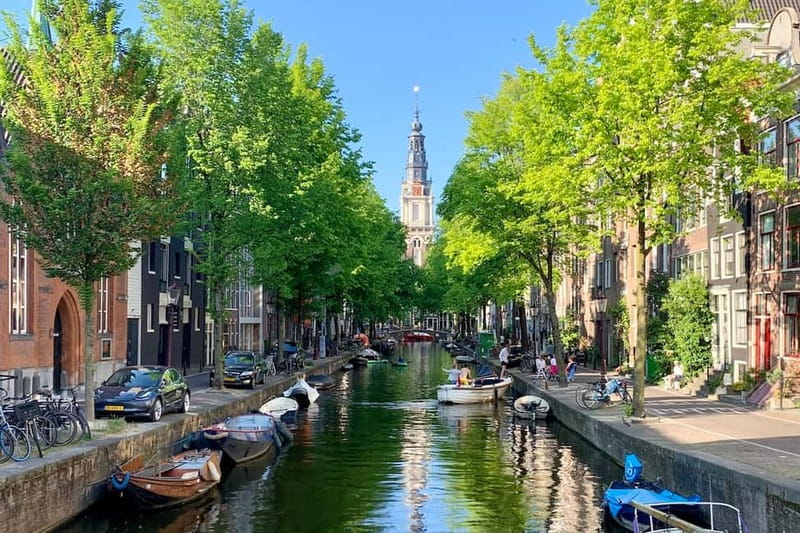 Amsterdam: Anne Frank Guided Walking Tour in DE/EN/IT/ES - Starting at De Waag in Nieuwmarkt