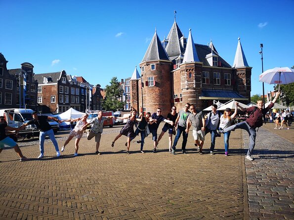 Amsterdam Introductory Walking Tour with a Local - Starting beneath the National Monument on Dam Square