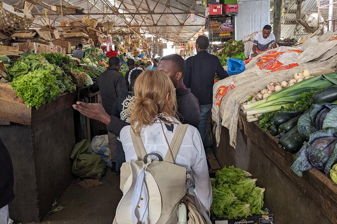 Arusha Guided Walking City Tour, Culture, Lifestyle & History - Finding souvenirs at the Maasai market