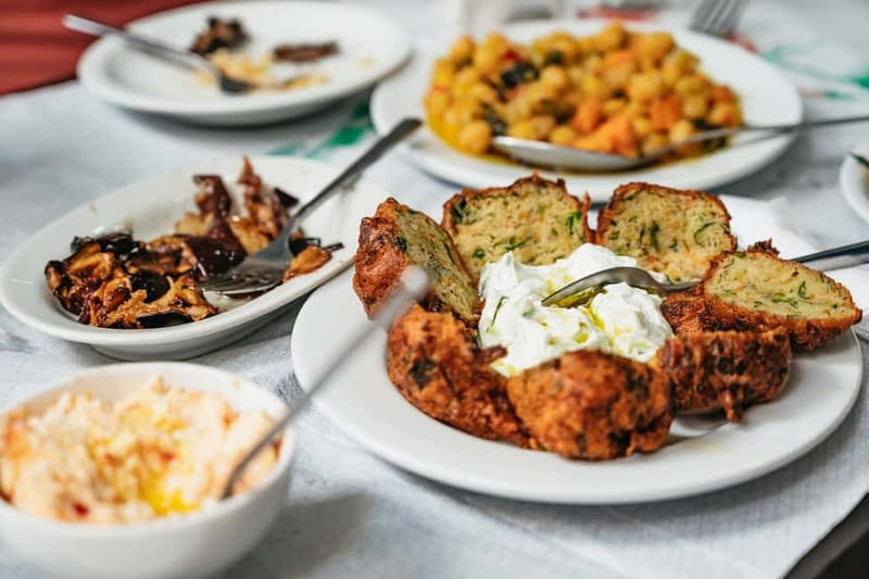 Athens: Guided Greek Food Walking Tour with Tastings - Inside Varvakios Agora’s meat and fish market