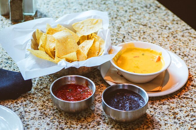 Austin Downtown Private Walking Food Tour With Secret Food Tours - Willie Nelson’s statue adds a quick Austin marker