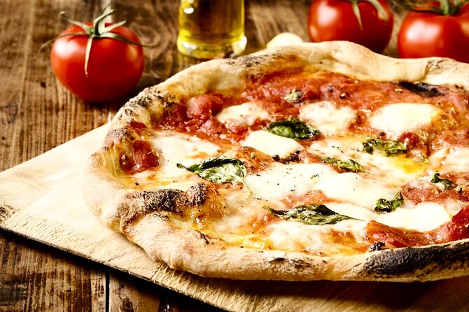 Authentic Naples Food Tour with 8+ Tastings of Pizza, Wine & More - Via dei Tribunali turns the tour toward pizza