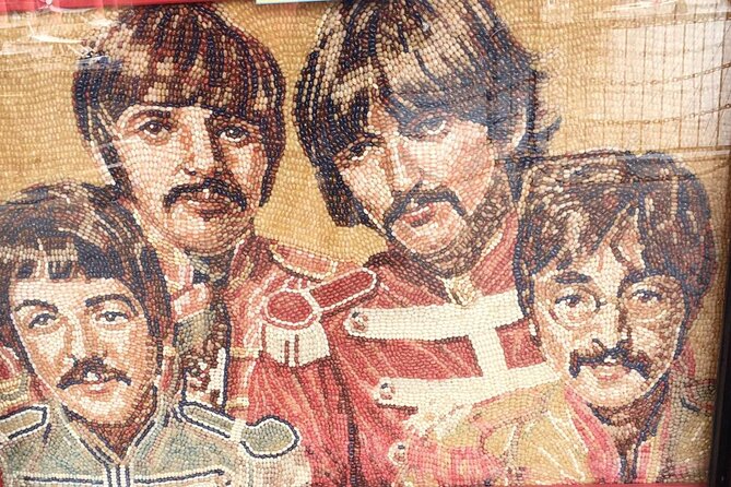 Beatles Famous Walking Tour Of Liverpool- Fully Guided - Derby Square and a famous Beatles image