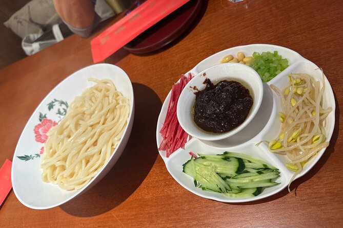 Beijing Walking Food Tour with a Local Friend - A two-hour route with a meal at its center