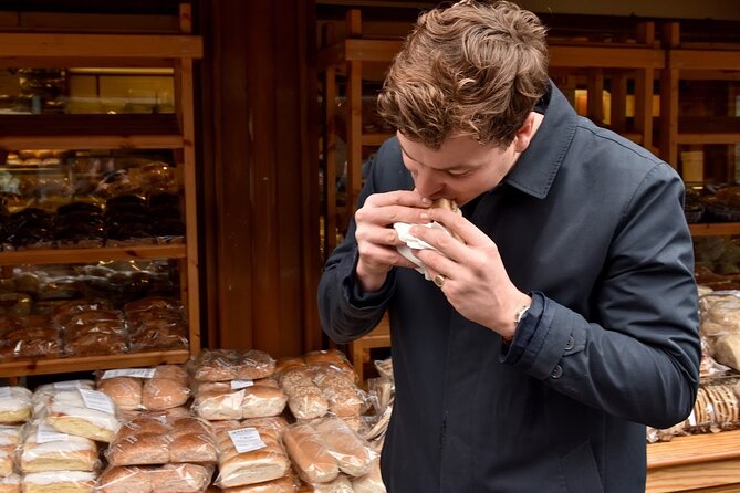 Belfast Centre Food Tour of 12+ Local Irish Dishes & Drinks - The Cathedral Quarter between bites