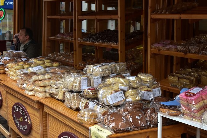 Belfast Centre Food Tour of 12+ Local Irish Dishes & Drinks - Pubs, bakeries, and family-run stops