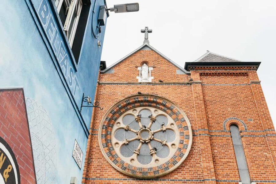 Belfast: The Troubles Walls & Bridges Guided Walking Tour - Returning through the gates to the city center