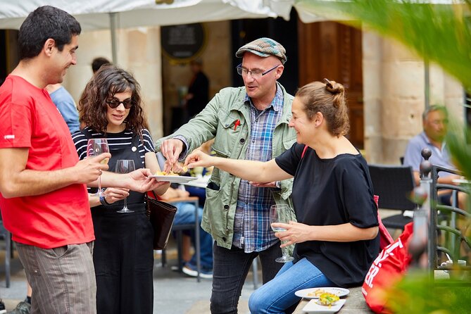 Bilbao Food Tour – Basque Gastronomy Experience - Crossing Arenal Park and the Arriaga Theater