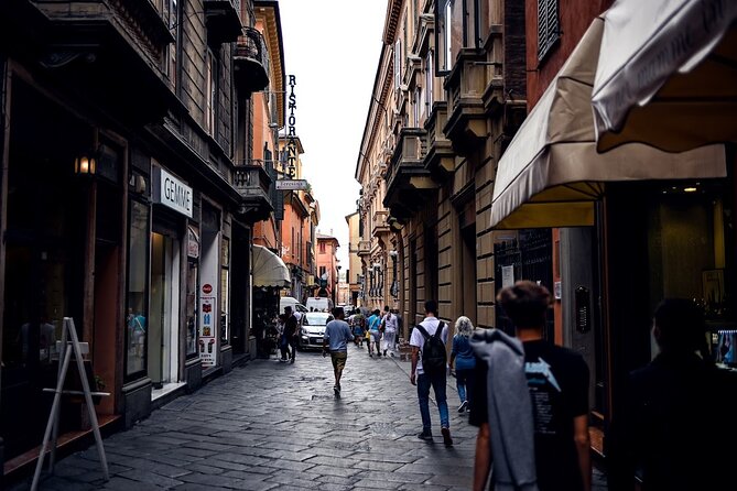 Bologna Food & Market Tour with 6 Tastings, Pasta, Wines & More - Parmigiano Reggiano, Parma ham, and Mortadella