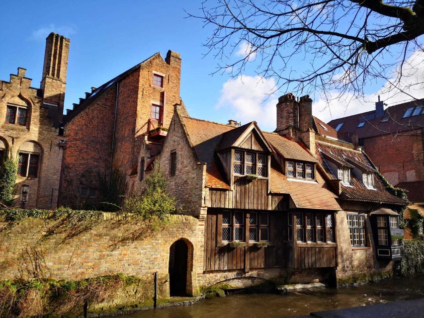 Bruges: Guided Walking Tour - Huidenvettersplein and the old trading center