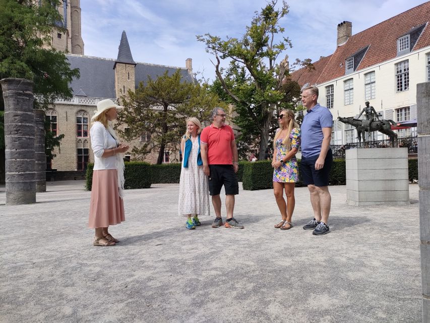 Bruges: Small Group Boat Cruise and Guided Walking Tour - Forty minutes on Bruges’ canals