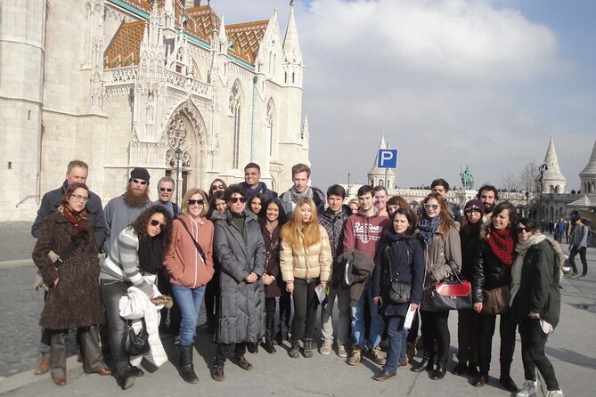 Budapest: Castle District Walking Tour - Matthias Church, crosses, and the symbols of Buda