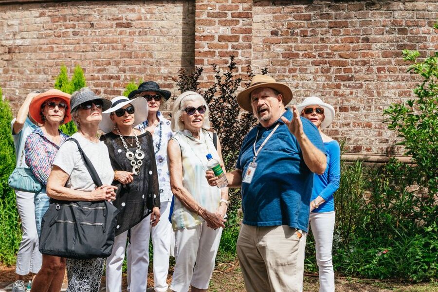 Charleston: Old Walled City Historical Walking Tour - Churches, public buildings, and difficult chapters