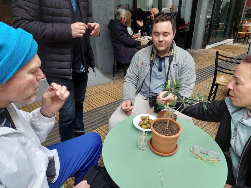 Eat Your Way Through Athens: A Local Food Walk - Cheese, sliced meats, olives, and tsipouro