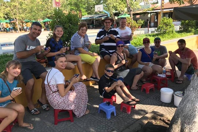 Evening Walking Food Tour, folk game and lantern boat - Vietnamese bingo and the pot-breaking game