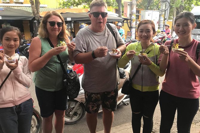 Evening Walking Food Tour, folk game and lantern boat - A 15-minute lantern boat ride