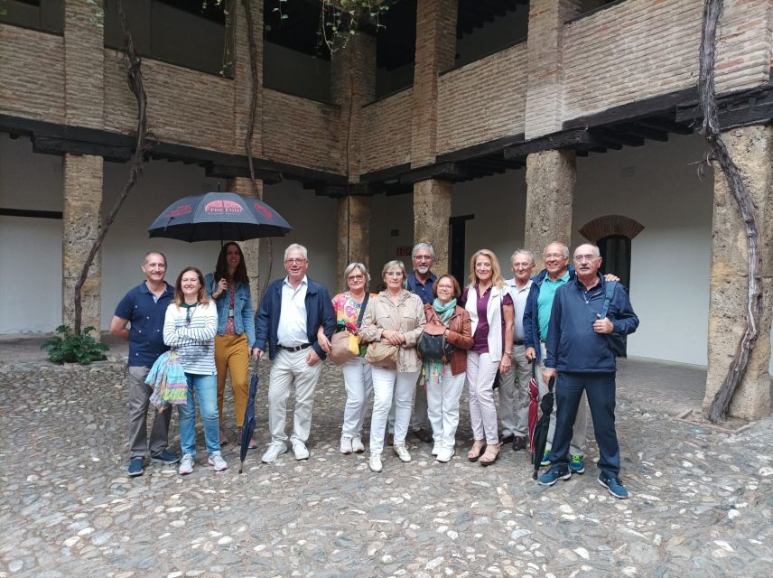 Granada: Historic Center and Lower Albaicin Walking Tour - Corral del Carbón and the old commercial heart