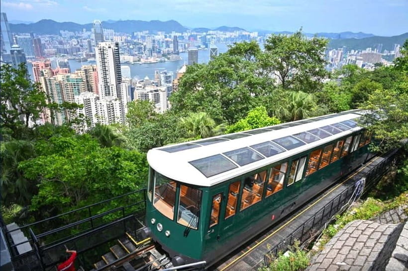 Hong Kong Day Tour: Priority Peak Tram, City Walk & Dim Sum - Old Town Central shows Hong Kong at street level