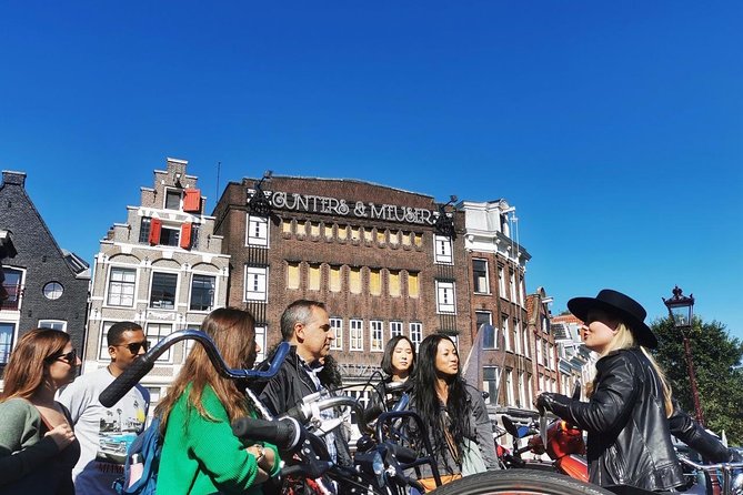 Humans of Amsterdam: Cultural Walking Tour incl. meeting 2 locals - Finish with beer and a brewery story