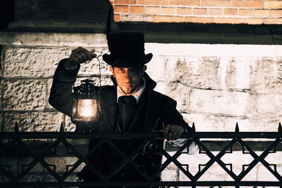 Krakow: Legends and Tales of Old Town Walking Tour - Gothic costume, lantern, and a guide who carries the evening