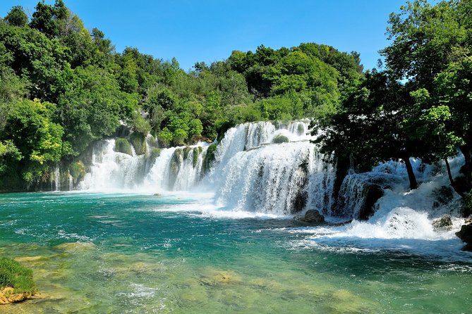 Krka Waterfalls tour with Trogir Walking tour and Krka panoramic boat cruise - The 30-minute boat ride through the Krka area