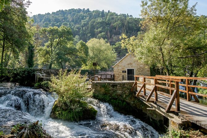Krka Waterfalls tour with Trogir Walking tour and Krka panoramic boat cruise - Guides, transport, and group size
