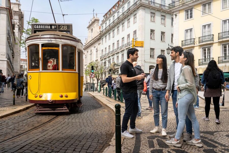 Lisbon: Helicopter Ride, Boat Trip, & Old Town Walking Tour - Praça do Comércio opens Lisbon to the Tagus
