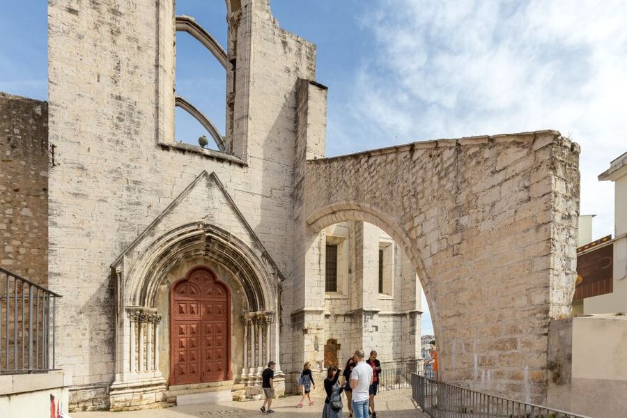Lisbon: History, Stories and Lifestyle Walking Tour - Alfama brings the tour down to street level