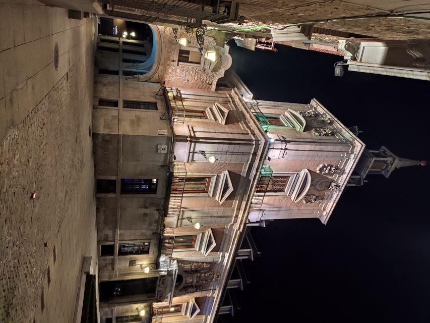 Madrid: Enchanted Evening Walking Tour in Spanish - Almudena Cathedral and the city’s older layers