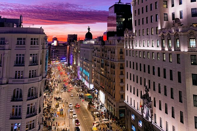 Madrid Walking Tour from Puerta del Sol to Retiro Park - Banco de España and a famous fictional robbery
