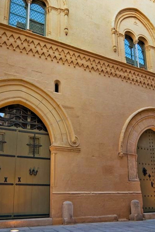 Malta: Mdina and Rabat Walking Tour with Catacombs - Palazzo Falzon, Vilhena Palace, and the city’s grand buildings
