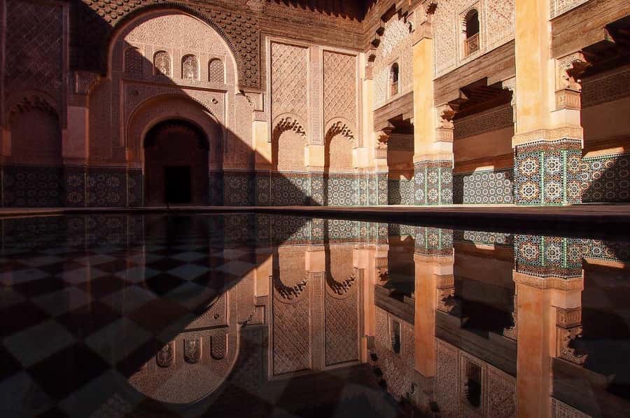 Marrakech: Ben Youssef, Secret Garden, & Souks Walking Tour - Mouassine and the shift from monuments to daily life