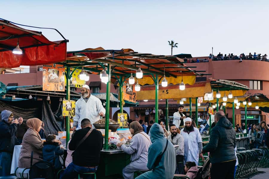Marrakech: Medina by Night Walking Tour with Moroccan Tea - Who should book this evening walk?