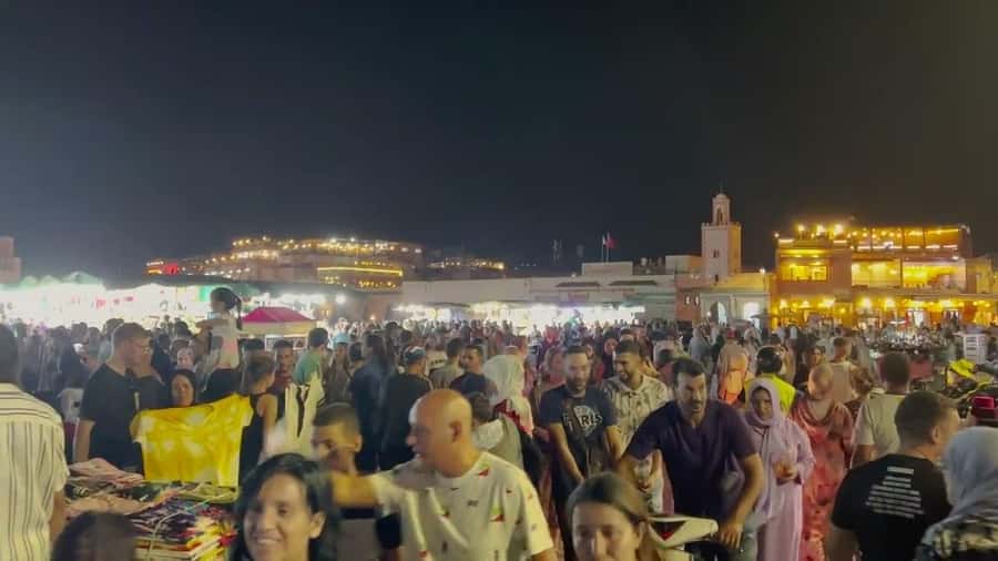 Marrakech: Souk by Night Medina Guided Walking Tour. - Medina lanes, local snacks, and sunset light