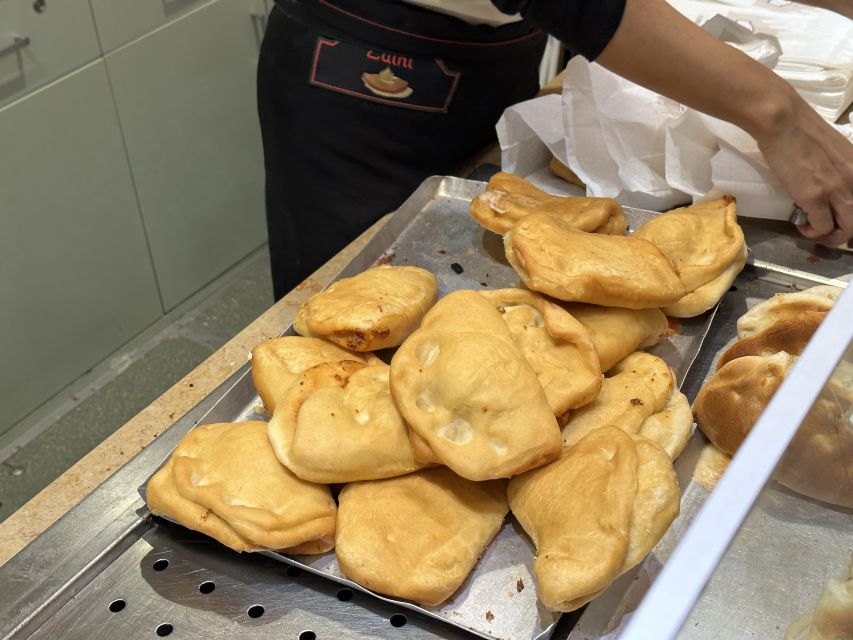 Milan: Guided Street Food Walking Tour with Food Tasting - Piazza Affari and the L.O.V.E. statue