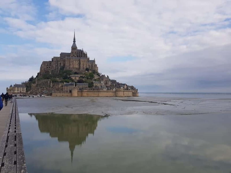 Mont Saint Michel: Village History and Legends Walking Tour - Following the village lanes and the Abbey story