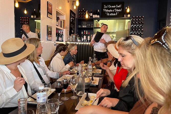 Montmartre Hill French Gourmet Food and Wine Tasting Walking Tour - The Wall of Love and Place du Tertre