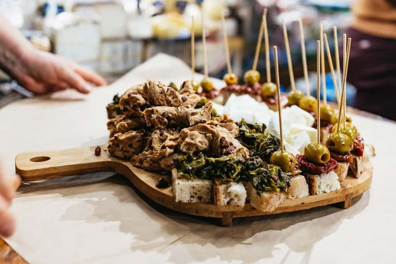 Naples: Street Food Walking Tour with Local Guide - Fresh mozzarella in a local salumeria