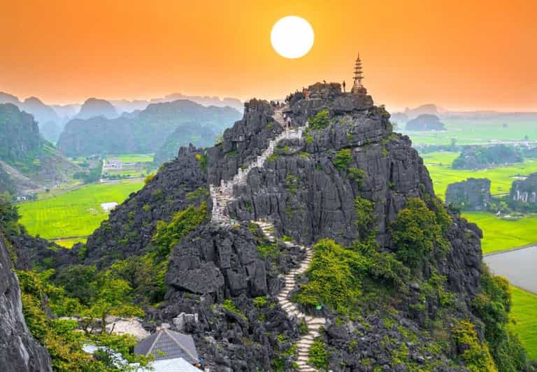 Ninh Binh Sunset Tour And Visit Hoa Lu Walking Town At Night - Leaving Ninh Binh by motorbike