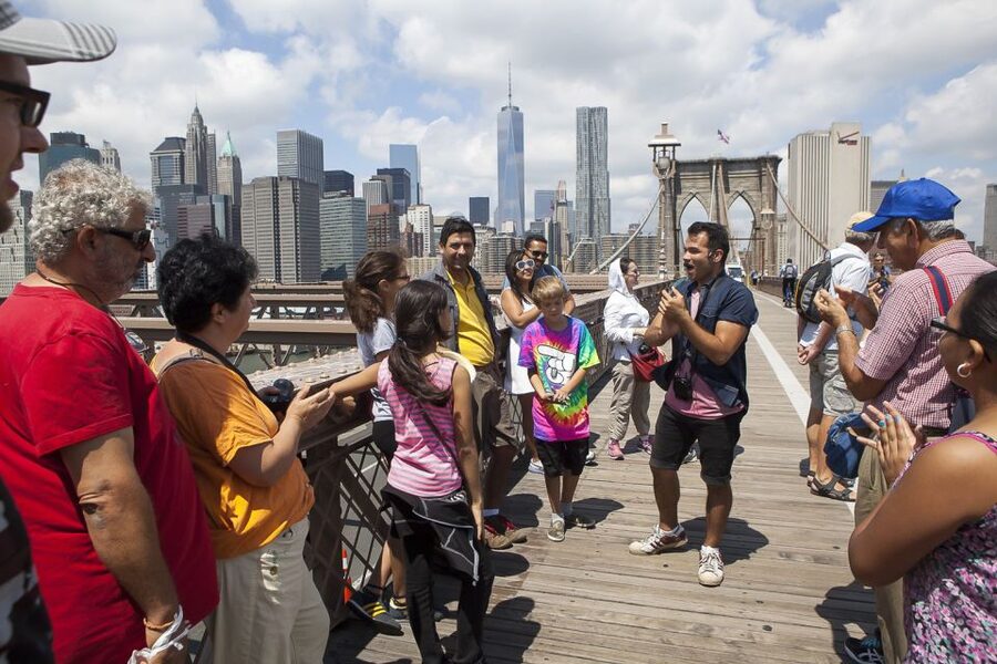 NYC: Brooklyn Bridge and Dumbo District Walking Tour - Crossing the Brooklyn Bridge with a story to follow