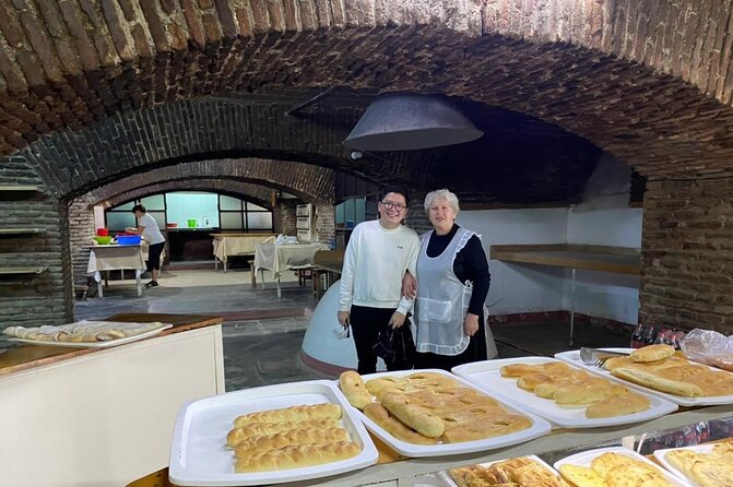 Old Tbilisi Highlights Walking Tour with Wine & 10 Tastings - The Gabriadze Clock Tower and Old Tbilisi streets
