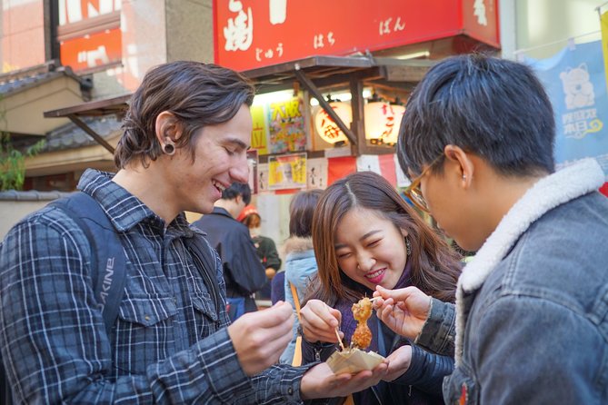 Osaka Local Foodie Walking Tour in Dotonbori and Shinsekai - Starting in Shinsekai beneath Tsutenkaku Tower