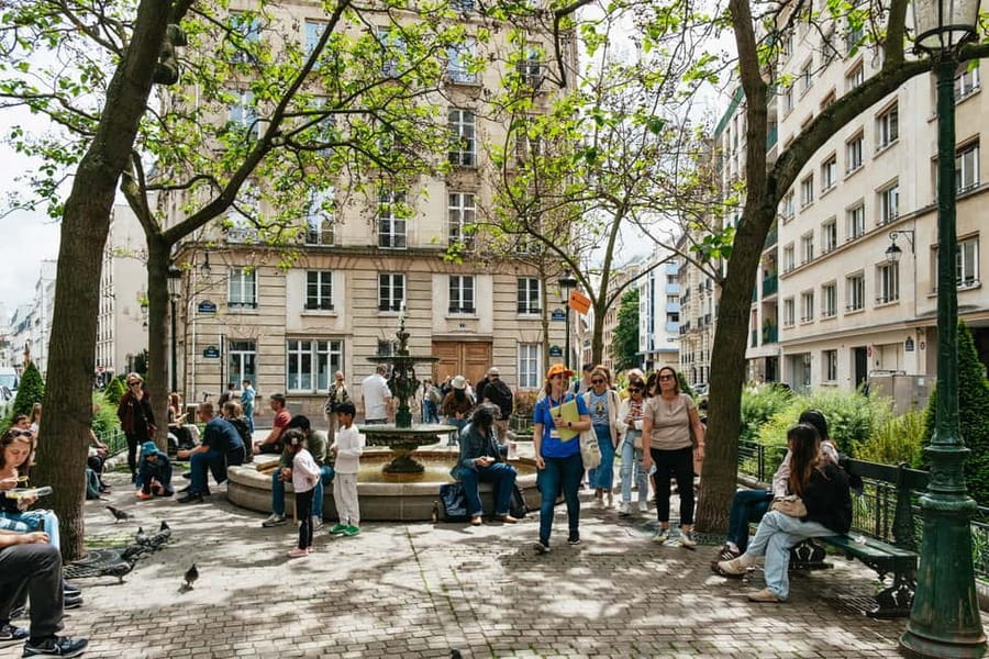 Paris: Emily TV Show Locations Guided Walking Tour - Place de Valois and Emily’s workplace