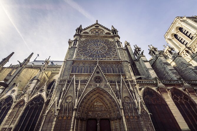 Paris in a Day: Louvre or Orsay, Eiffel Tower, City Walk & Cruise - The Eiffel Tower is the final landmark