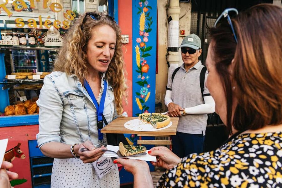 Paris: Montmartre Cheese, Wine & Pastry Guided Walking Tour - Walking uphill through the real Montmartre