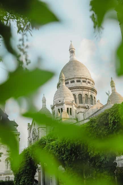 Paris: Montmartre Guided Walking Tour - Place Blanche and the Moulin Rouge