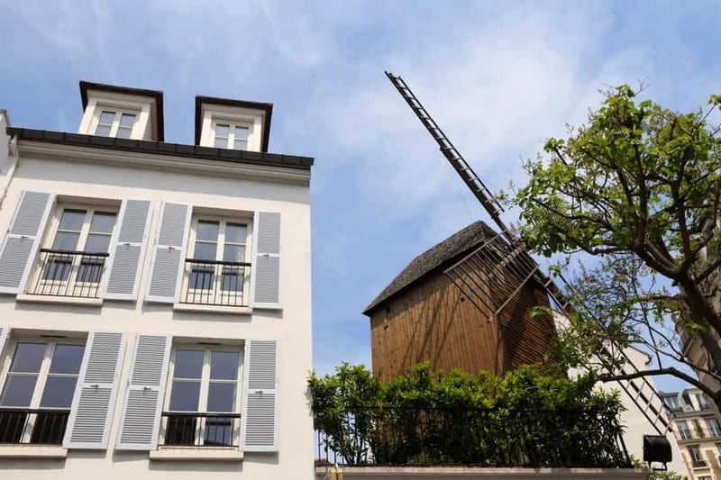 Paris: Montmartre Hidden Gems and Highlights Walking Tour - Moulin de la Galette and Montmartre’s art story