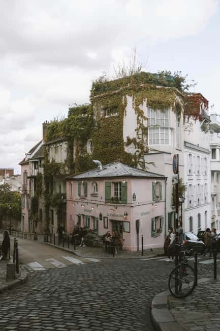 Paris: Montmartre hidden gems walking Tour with Local Guide - Walking downhill and uphill through the old village