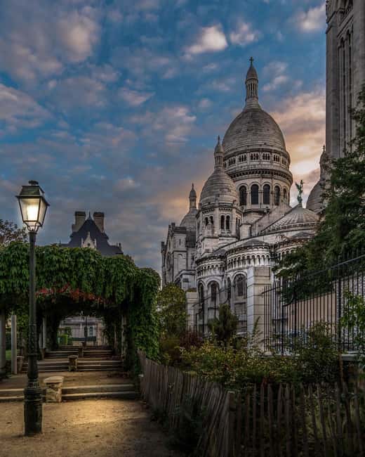 Paris: Montmartre hidden gems walking Tour with Local Guide - Moulin de la Galette and the old windmill country