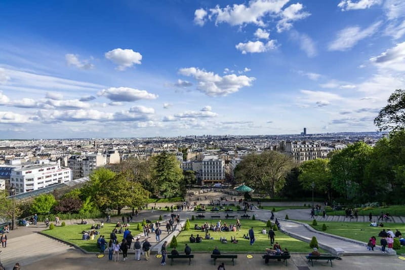 Paris: Montmartre Highlights Walking Tour with a Local Guide - Starting beneath Sacré-Cœur at Place Saint-Pierre